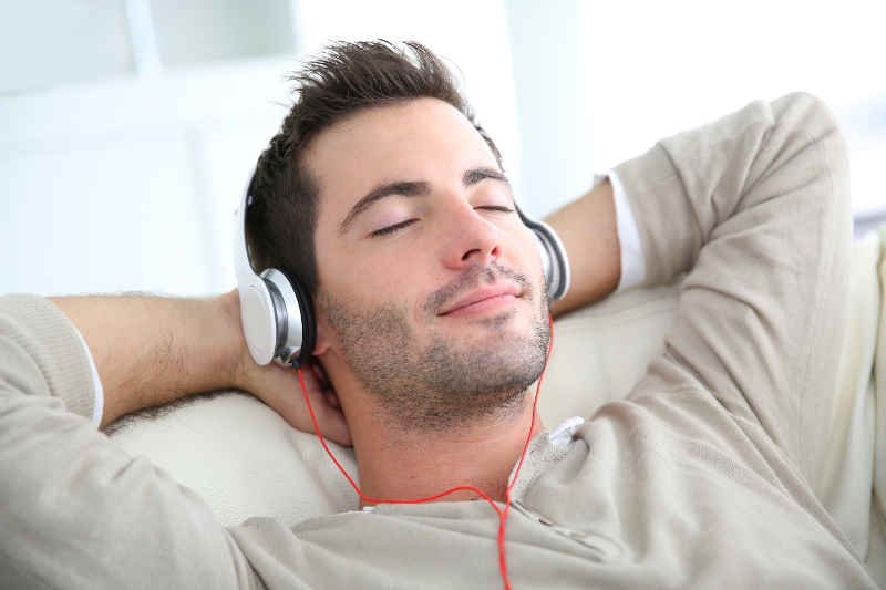 man listening to business soundscape